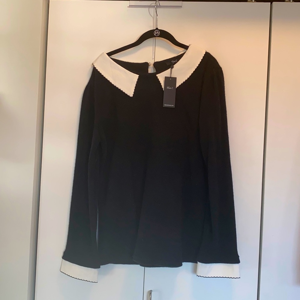 Black waffle knit sweater with collar and cuffs